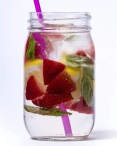 Image of water infused with strawberry, basil, and lemon